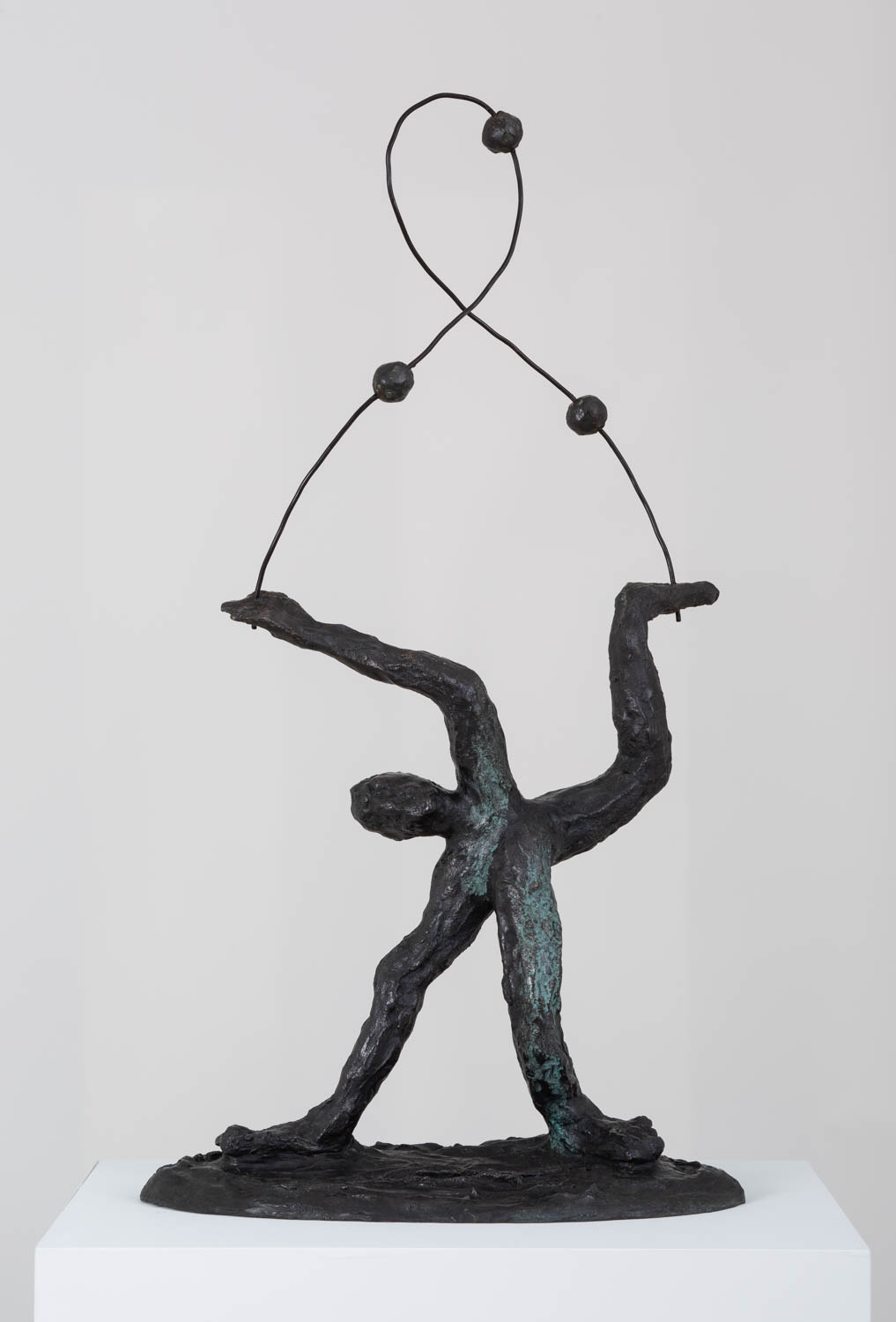 <em>man standing juggling three balls</em>, 2017<br />Bronze and steel<br />31 1/2 x 17 x 10 1/2 inches (80 x 43.2 x 26.7 cm)